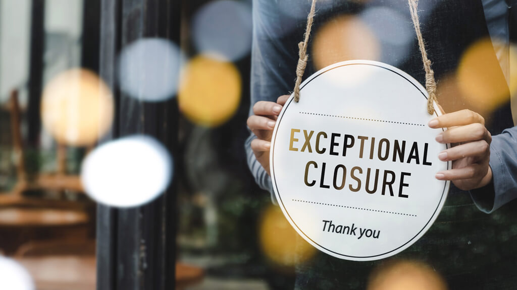 Store sign “exceptional closure, thank you”